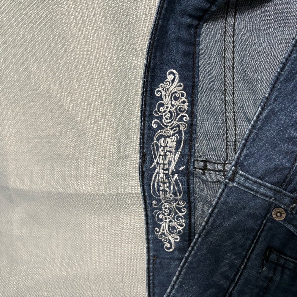 Express Women's Relaxed Blue Jeans with White Embroidery